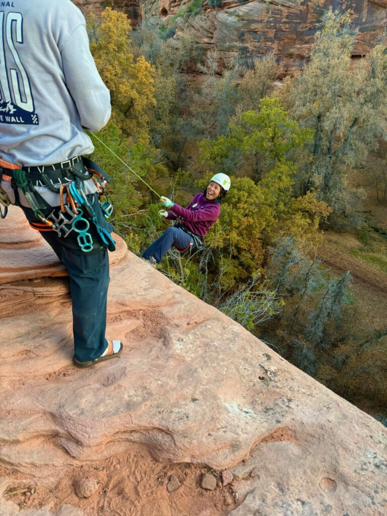 Rappelling into a canyon in Kanab