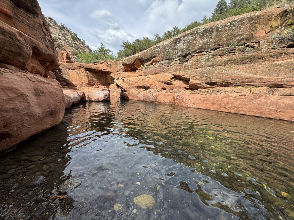 Girl swimming in the Crack Sedona